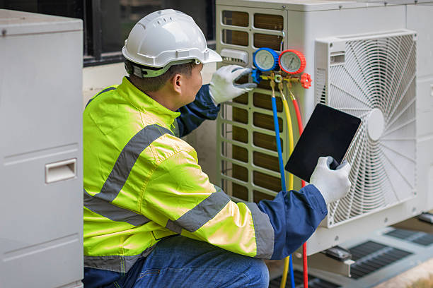 Professional Ductwork Repair technician working in Grand Junction, MI